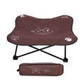 Brown pet bed with black legs and a matching carrying case on a white background